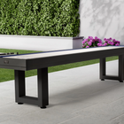 An American Heritage Lanai 9' Outdoor Shuffleboard Table in Obsidian Black sits on the patio.