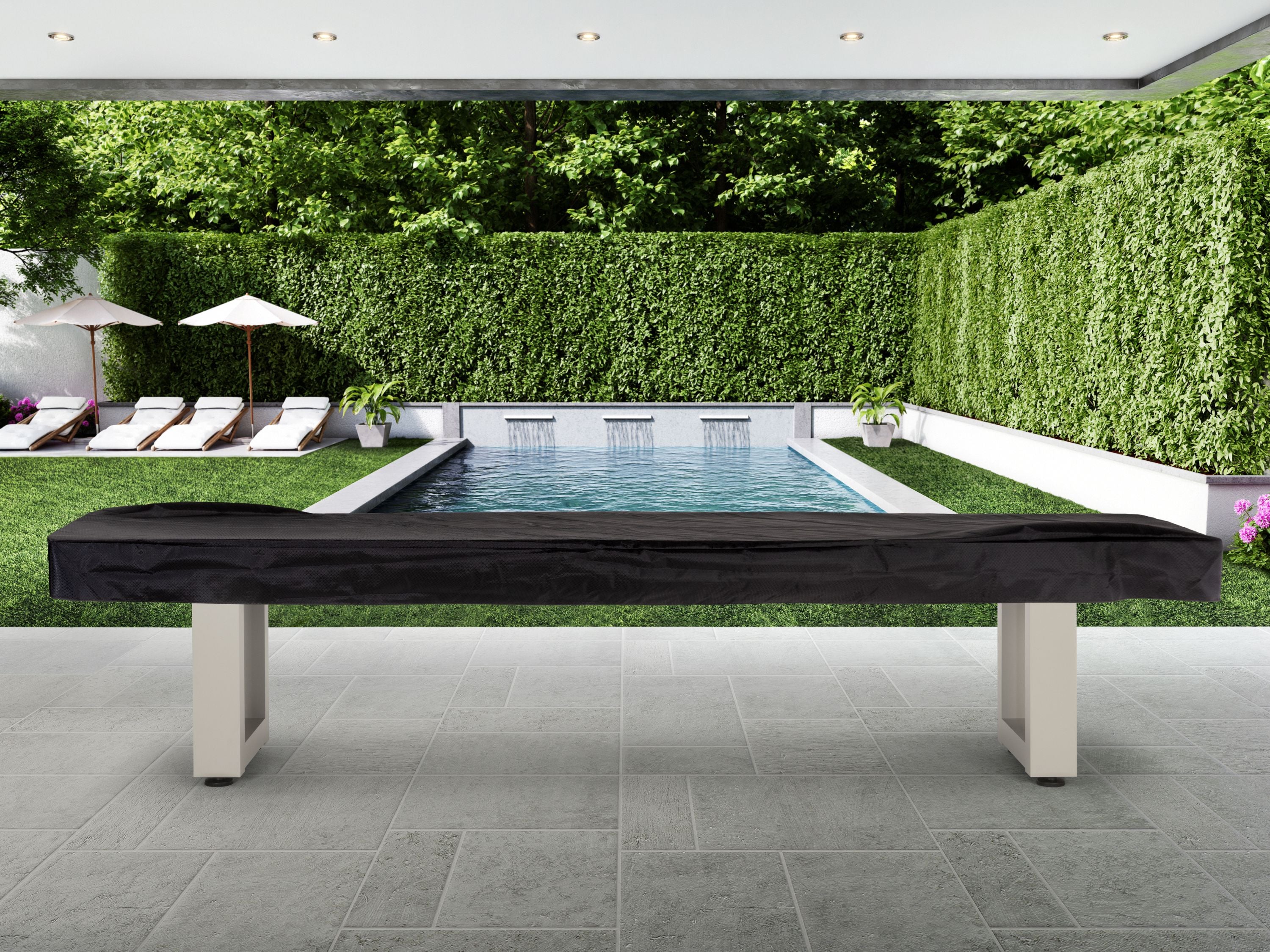 American Heritage Lanai 9' Outdoor Shuffleboard Table in Oyster Grey on patio by the pool.