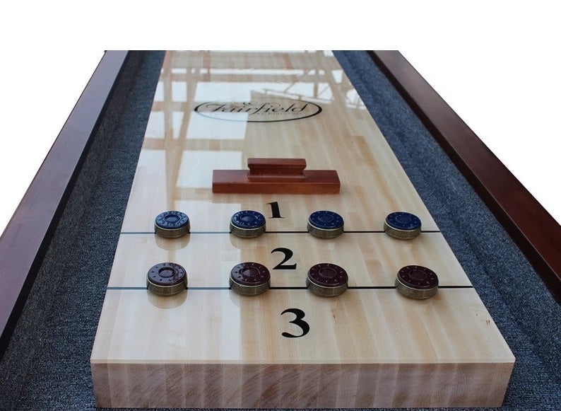 Playcraft Charles River 14' Pro-Style Shuffleboard Table in Chestnut with pucks on surface.